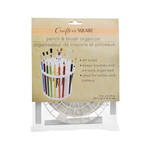 The Dollar Tree paintbrush holder carousels are PERFECT for