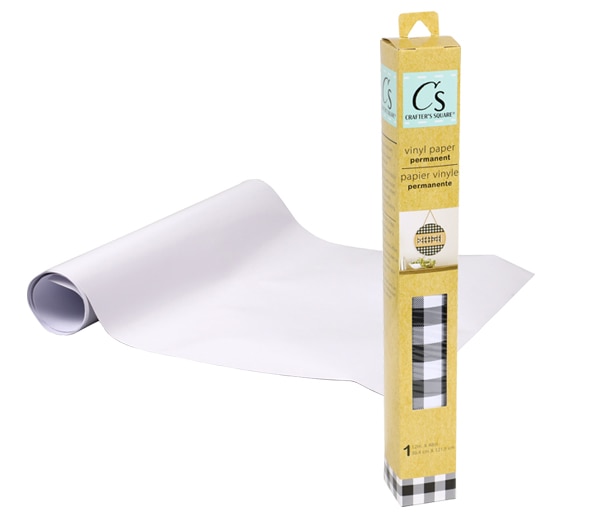 Roll of white cutting-machine vinyl and roll of black and white buffalo plaid cutting machine vinyl