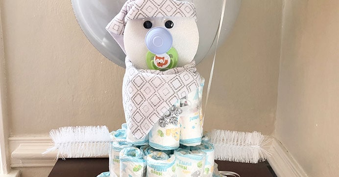 Diapers Cake Decorated with Ribbons with Animals for a Baby Boy Stock Image  - Image of shower, childhood: 208034591